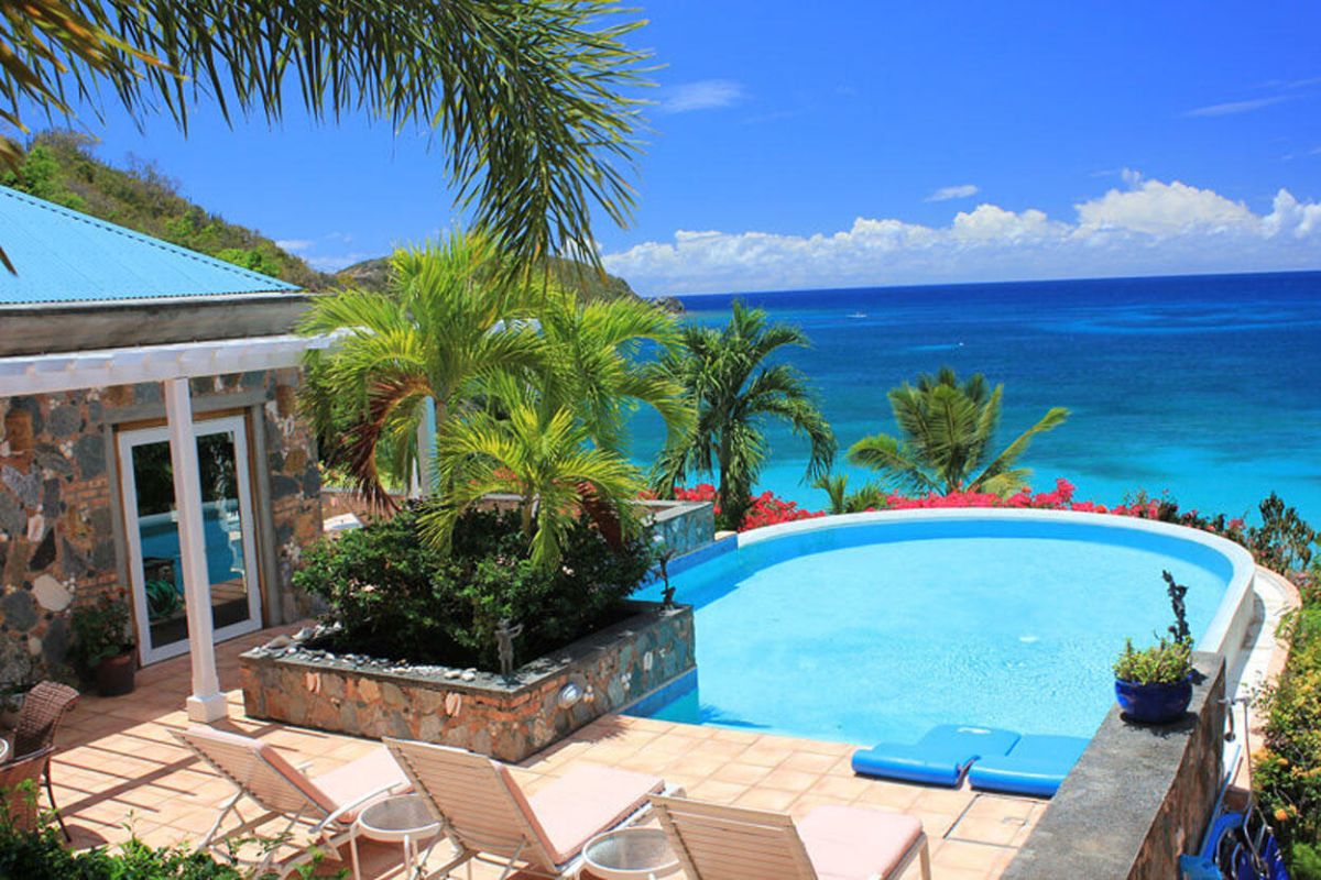 Carnival Beach House beachfront villa exterior in Klein Bay, St. John