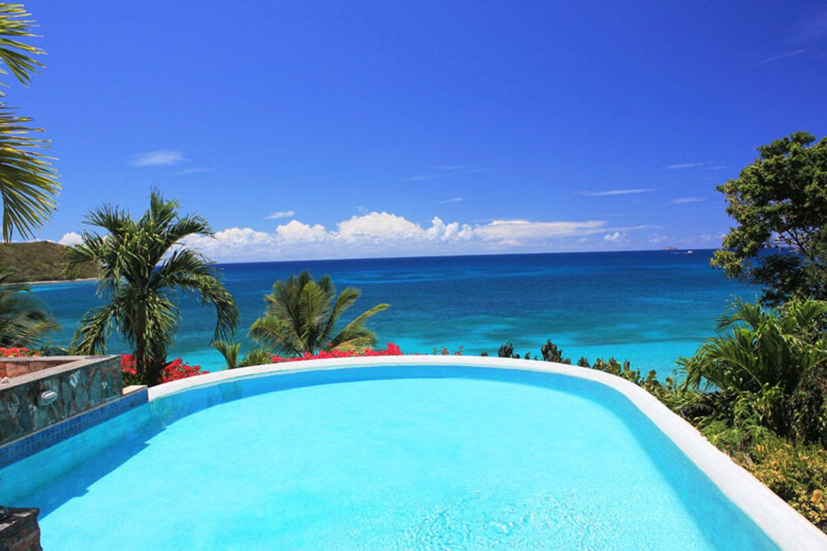 Carnival Beach House king bedroom with ocean views