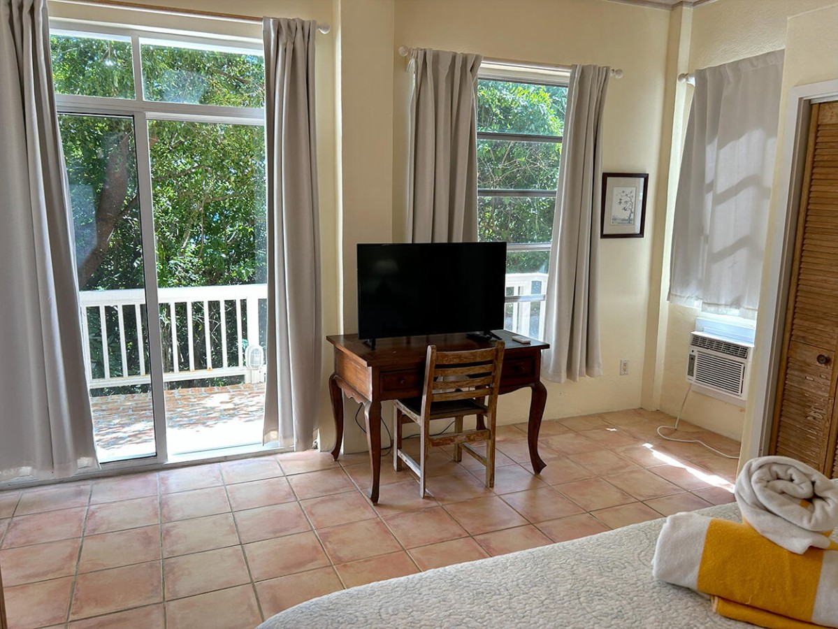 Surfside tropical garden and villa entrance